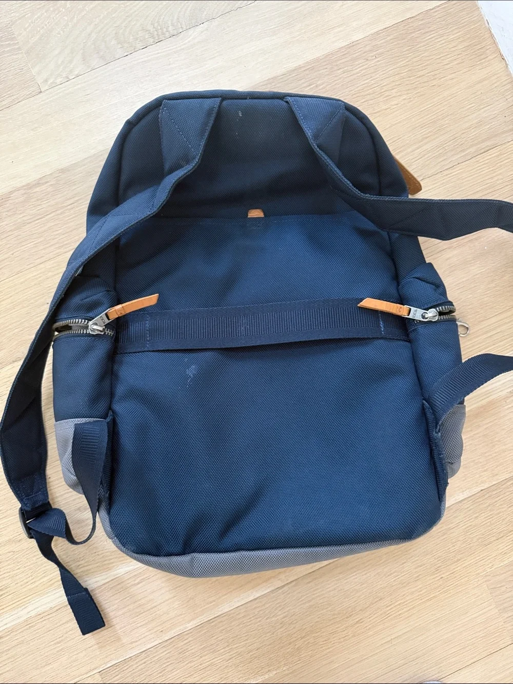 Tumi Navy and Gray Backpack with Tan Accents